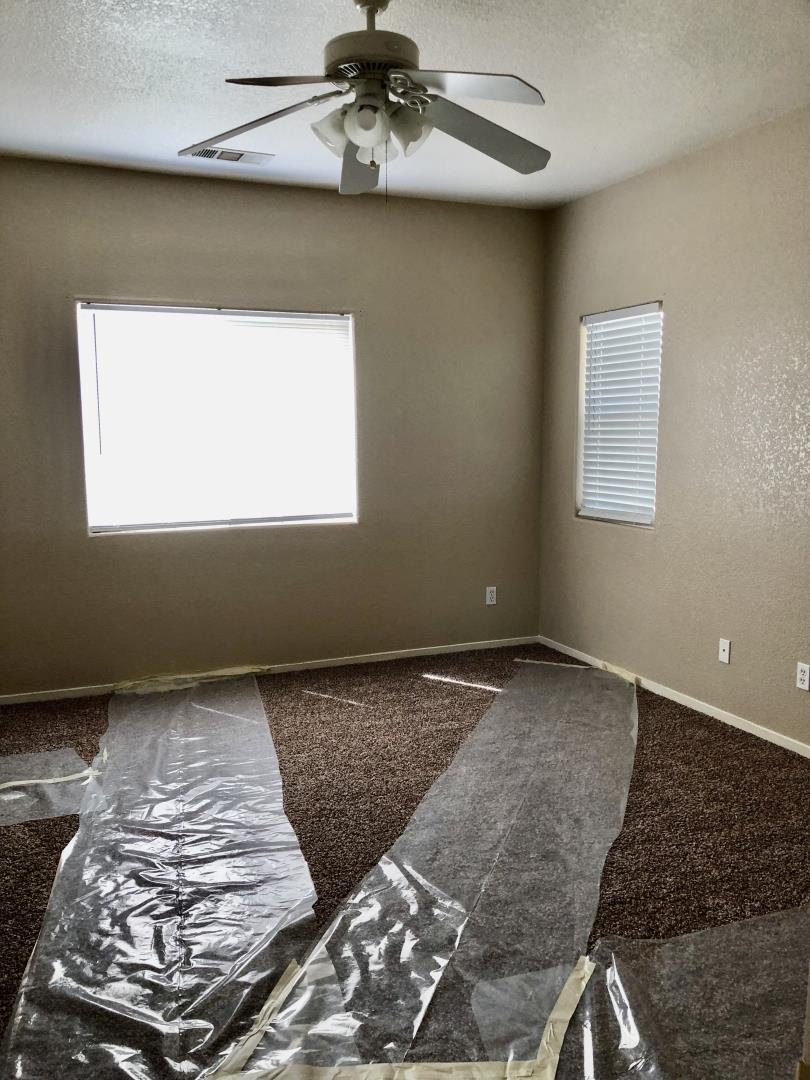6565 Nicholas Drive Winton, CA 95388 - Photo 11 of 17 a view of a livingroom with furniture and window
