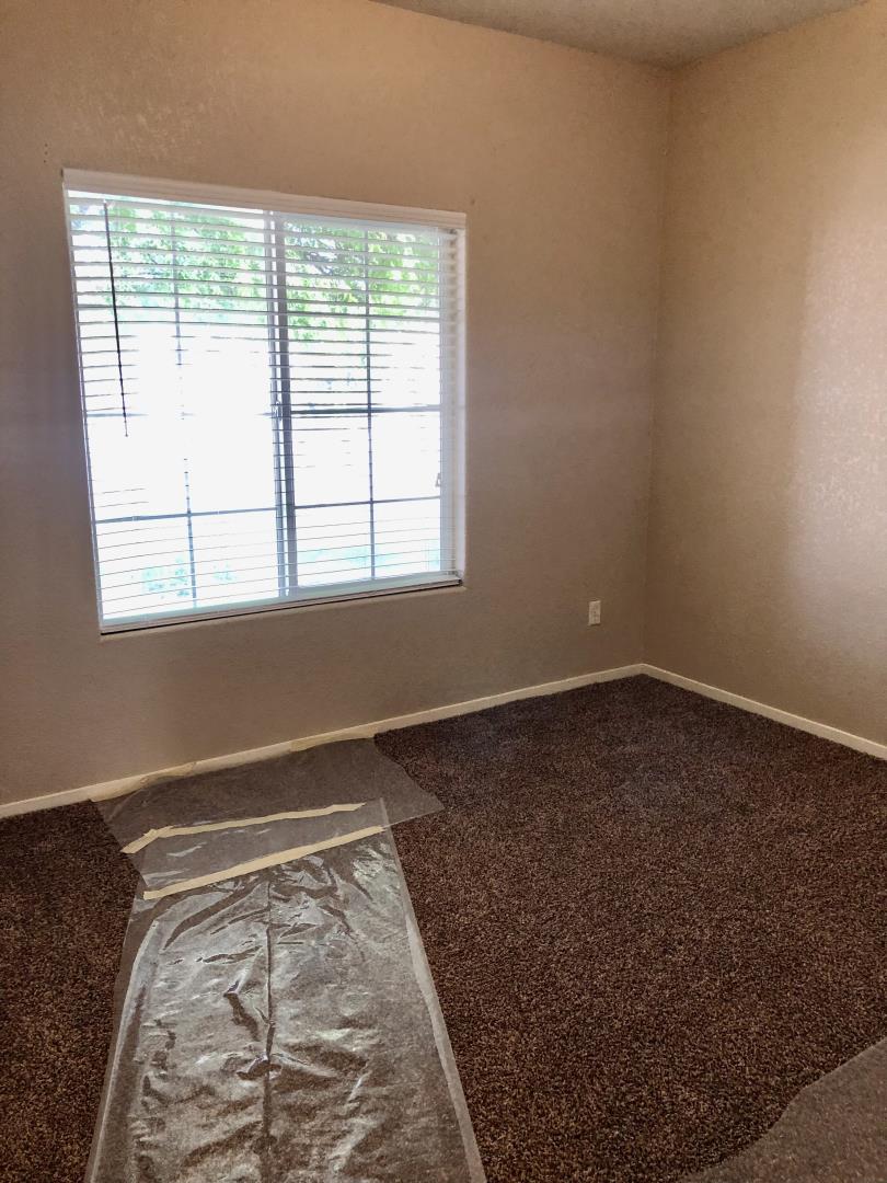 6565 Nicholas Drive Winton, CA 95388 - Photo 8 of 17 an empty room with windows