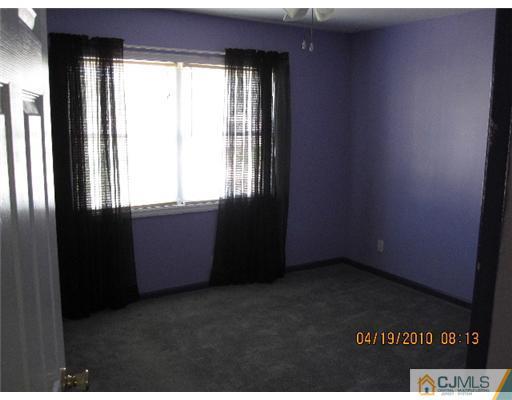 37 Wilcox Road New Brunswick, NJ 08901 - Photo 7 of 8 a view of an empty room and window