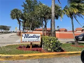 a sign that is on the side of the road