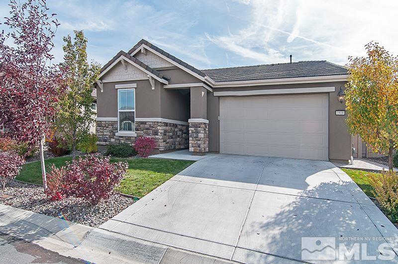 1808 Cholula Drive Reno, NV 89521 - Photo 1 of 1 a front view of a house with garden