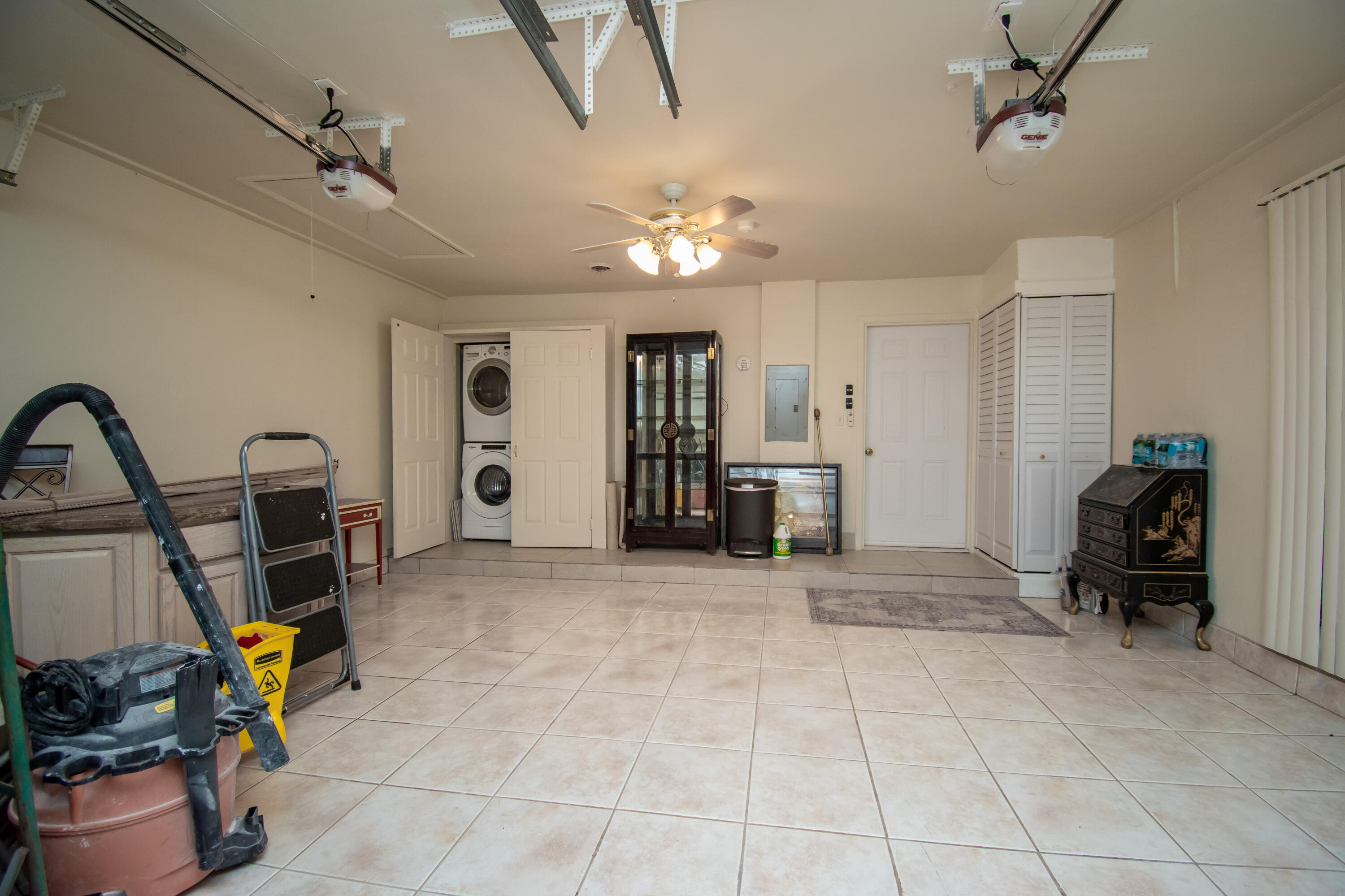 9708 Erica Court Boca Raton, FL 33496 - Photo 38 of 54 a view of a livingroom with furniture and a ceiling fan