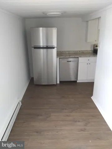 a view of a kitchen with a sink