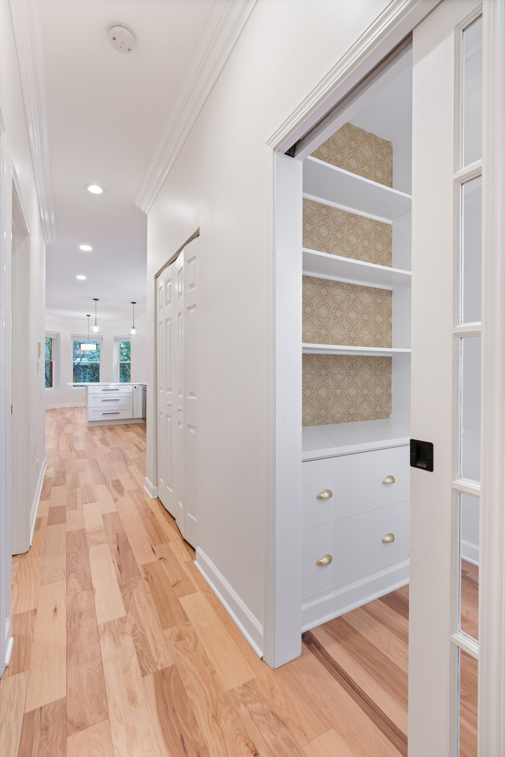 2315 West Rice Street, Unit 1N Chicago, IL 60622 - Photo 14 of 37 a view of a hallway with wooden floor