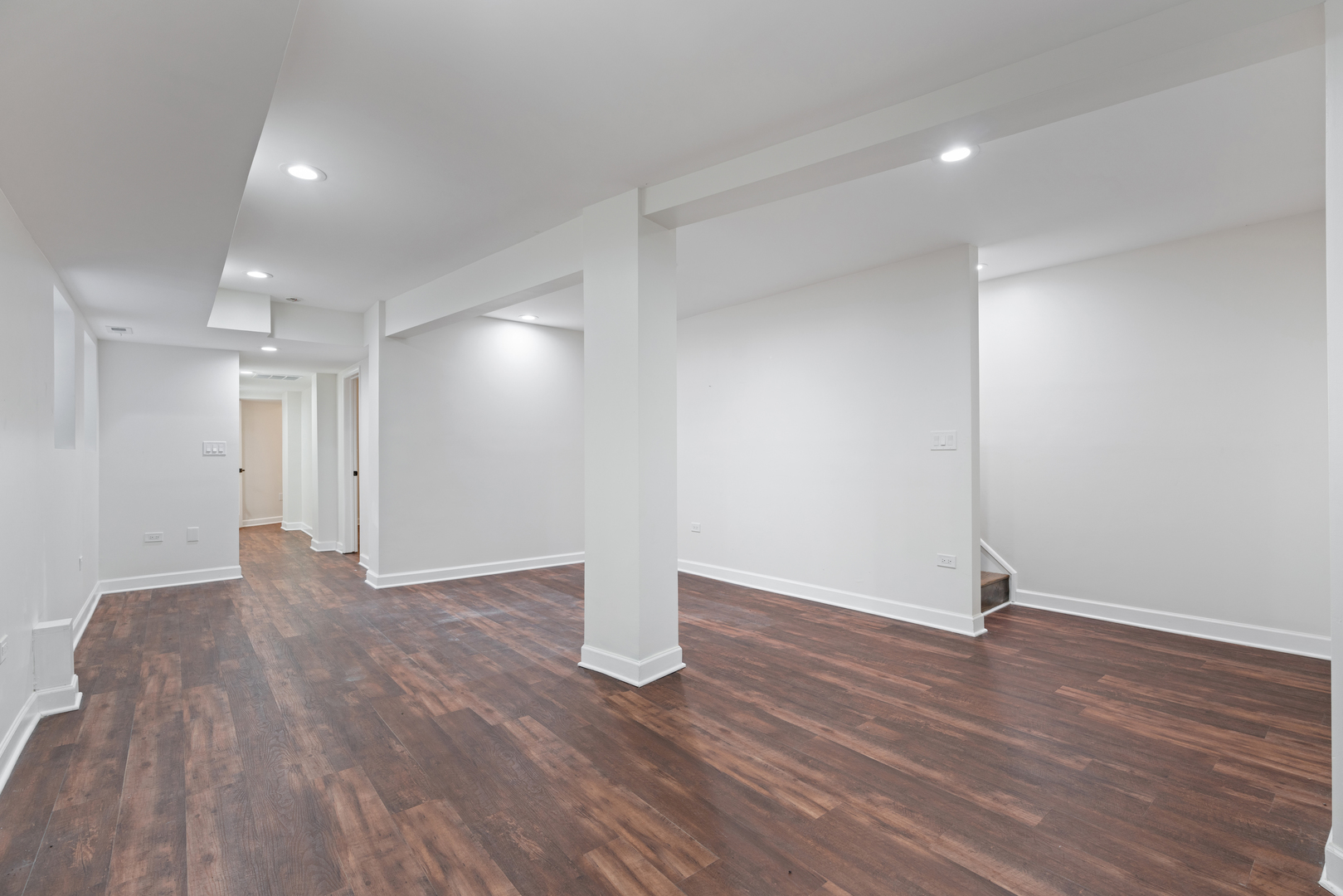 2315 West Rice Street, Unit 1N Chicago, IL 60622 - Photo 25 of 37 a view of an empty room with wooden floor