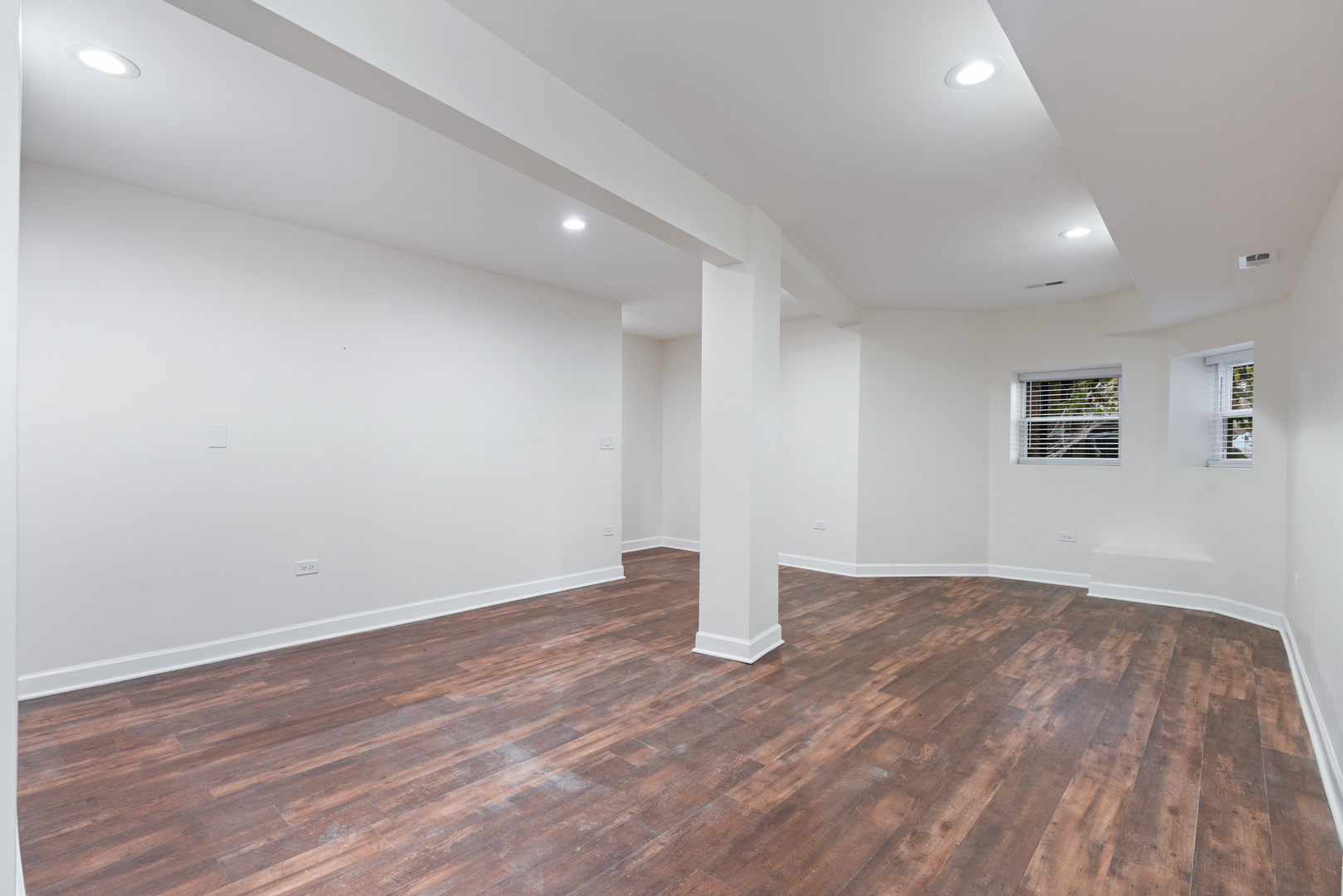 2315 West Rice Street, Unit 1N Chicago, IL 60622 - Photo 26 of 37 a view of an empty room with wooden floor