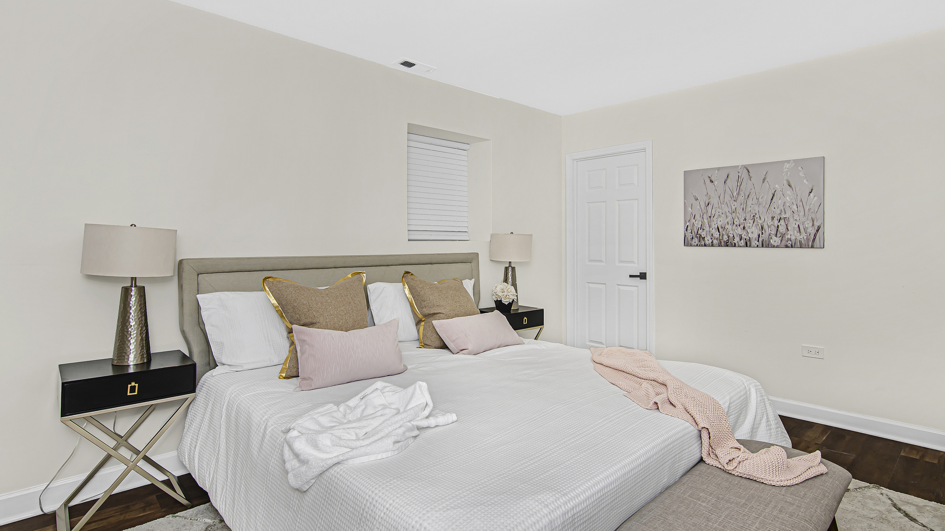 2315 West Rice Street, Unit 1N Chicago, IL 60622 - Photo 28 of 37 a bedroom with a bed and a night stand