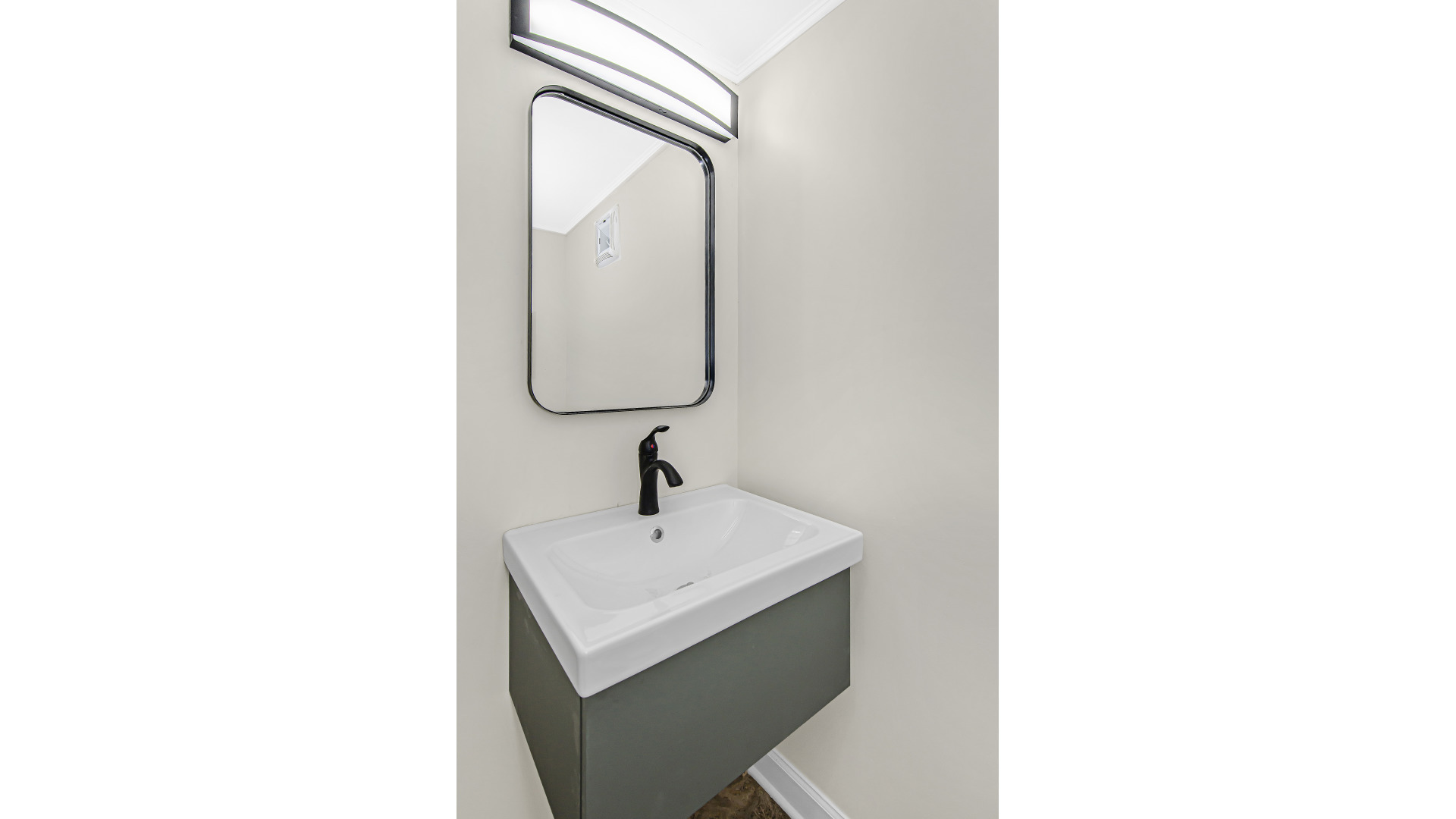 2315 West Rice Street, Unit 1N Chicago, IL 60622 - Photo 33 of 37 a bathroom with a sink and a mirror