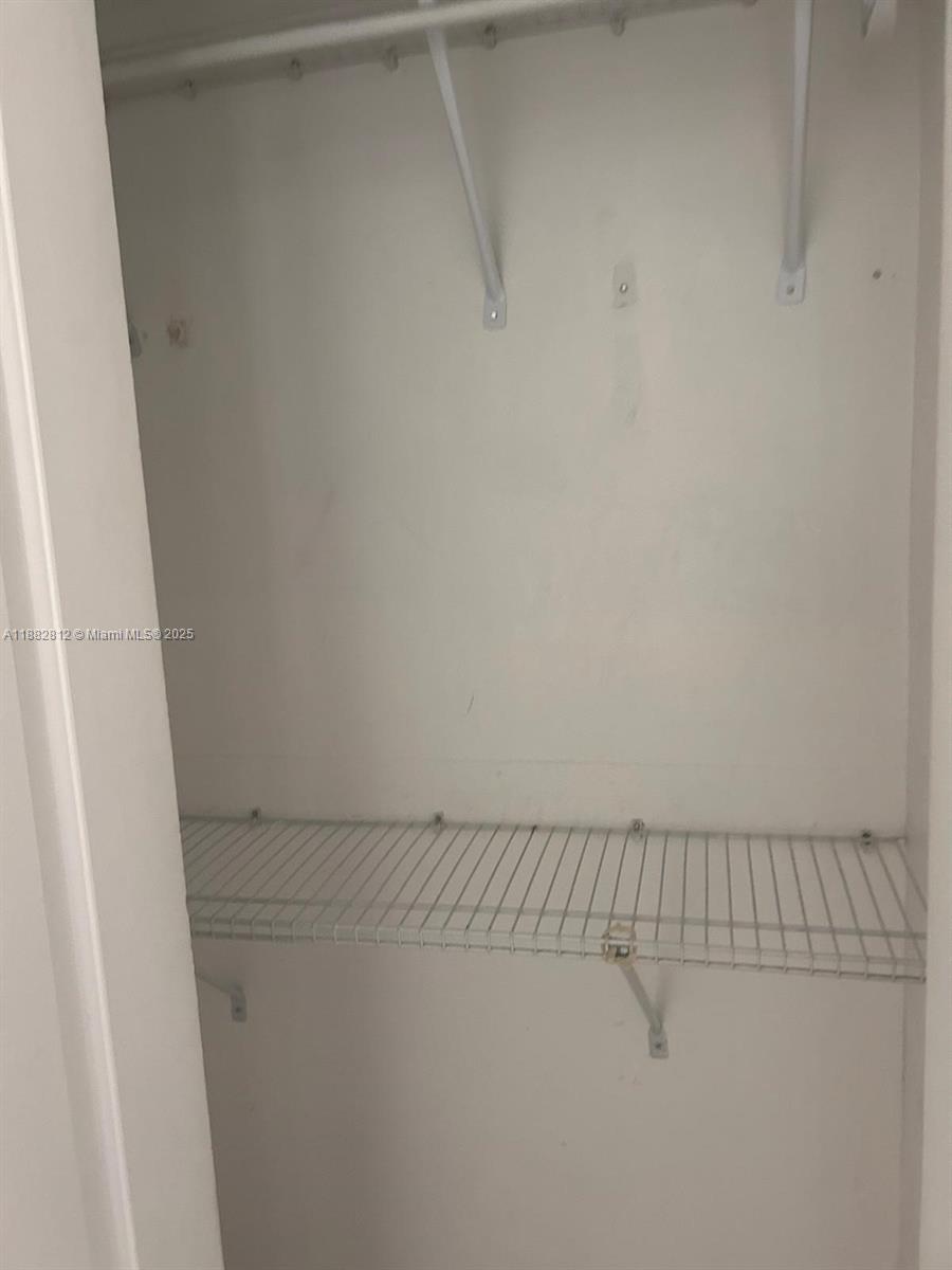 1601 Meridian Avenue, Unit 202 Miami Beach, FL 33139 - Photo 12 of 16 a view of a rack on the wall