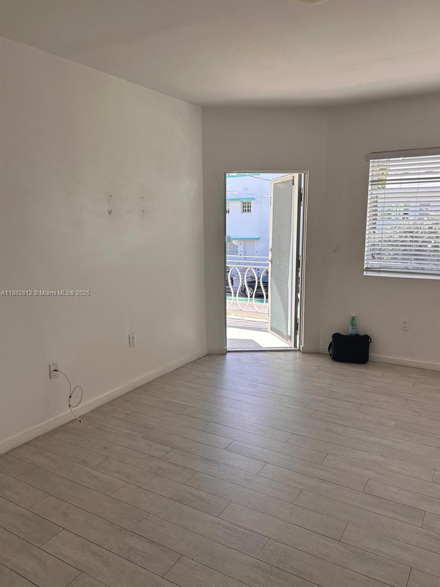 1601 Meridian Avenue, Unit 202 Miami Beach, FL 33139 - Photo 9 of 16 a view of an empty room