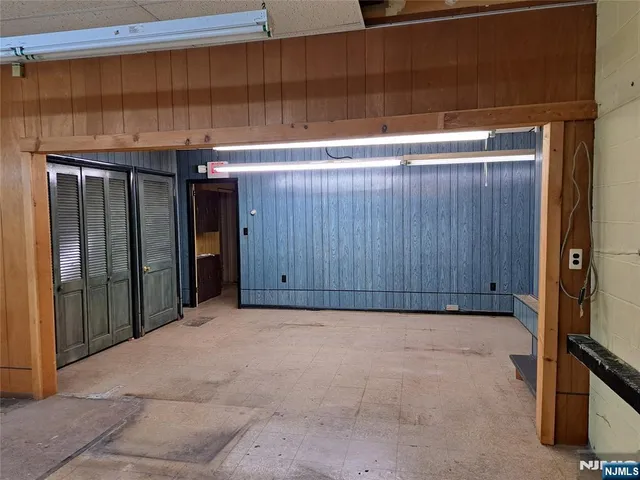 a view of wooden door and curtain