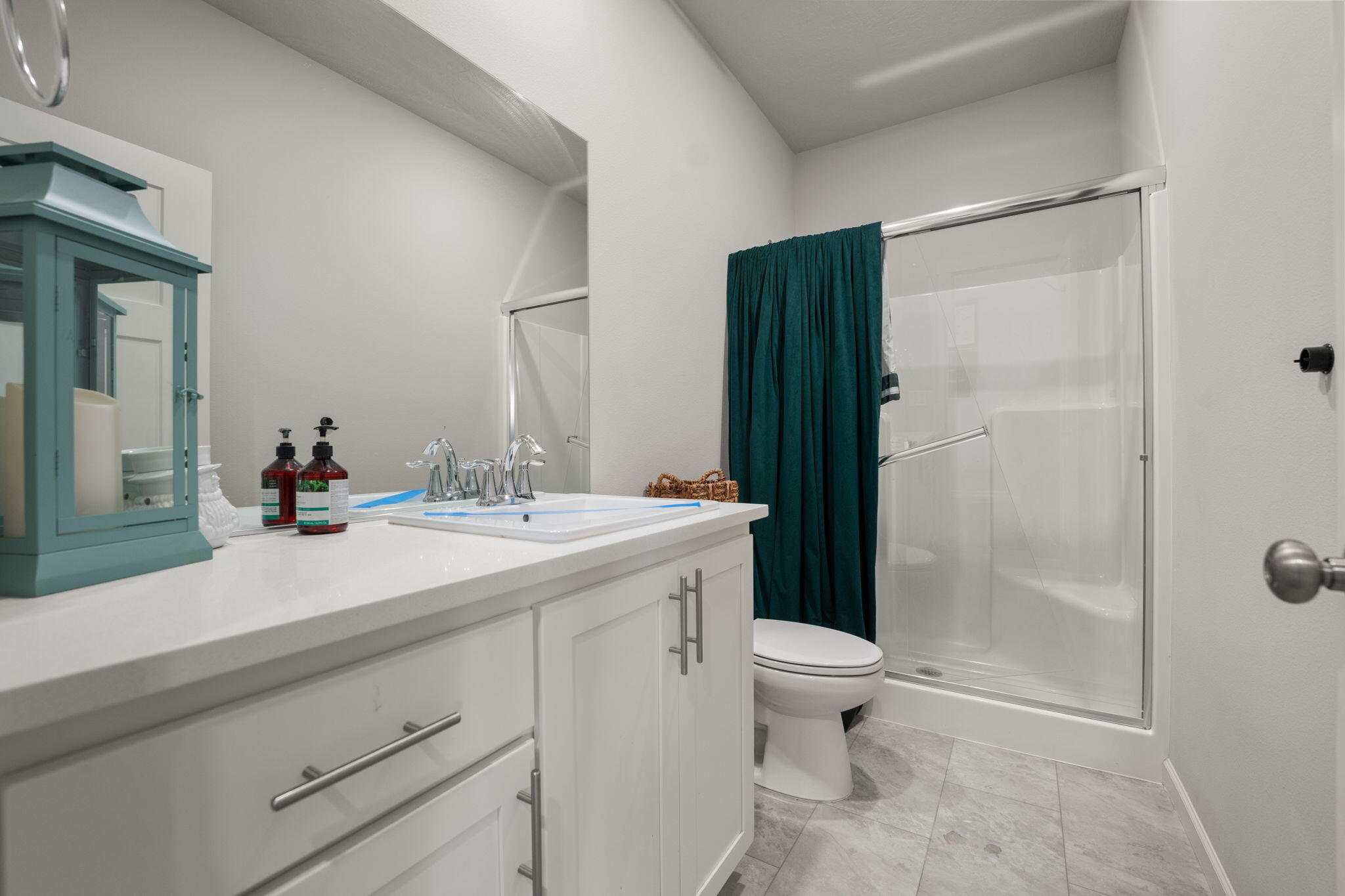 4039 Southwest Quartz Place Redmond, OR 97756 - Photo 7 of 44 a bathroom with a sink a toilet and shower