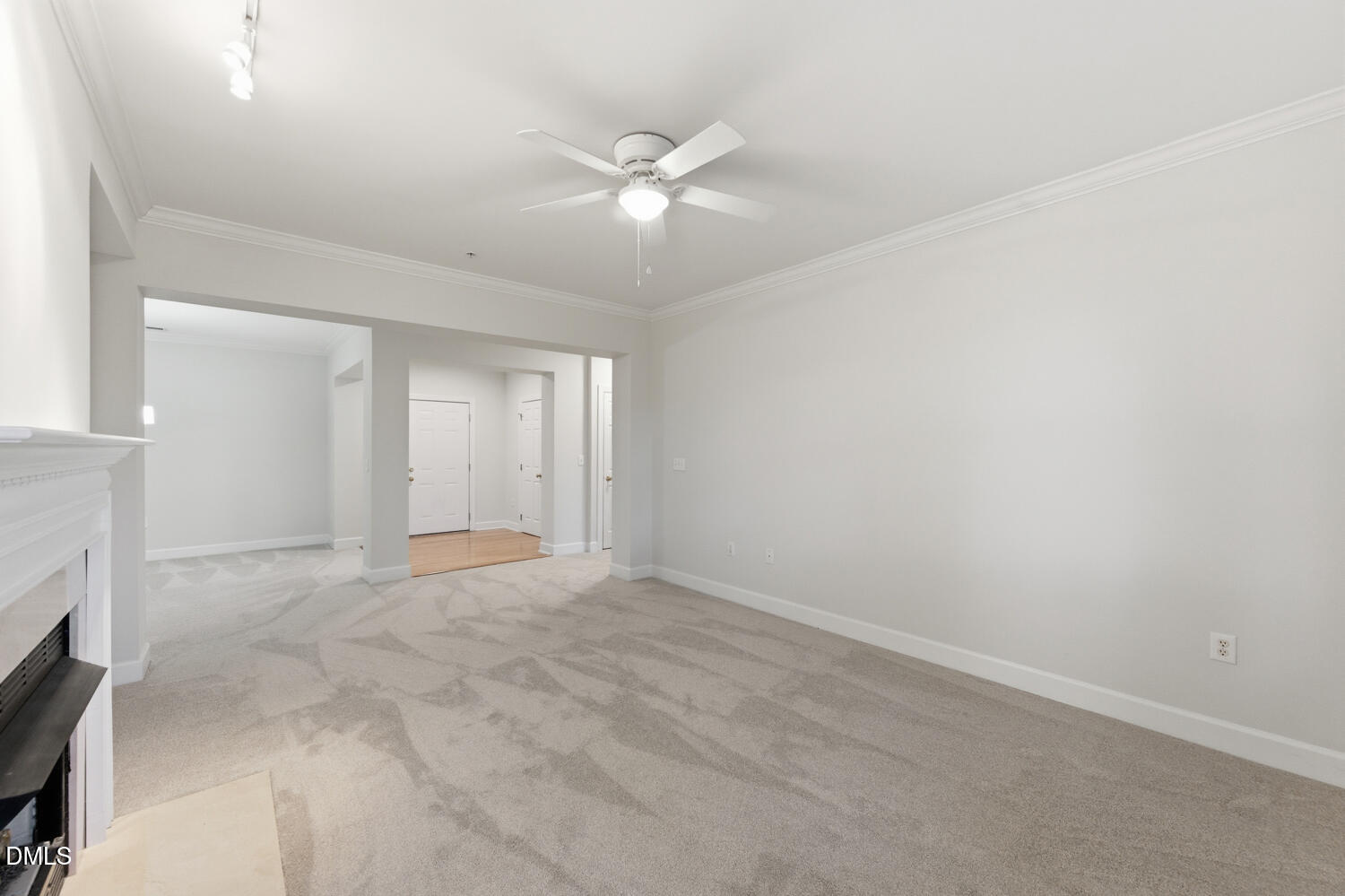 116 Northbrook Drive, Unit 204 Raleigh, NC 27609 - Photo 13 of 94 an empty room with a ceiling fan and a window