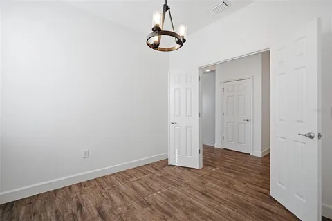 a view of a room with racks on the wall
