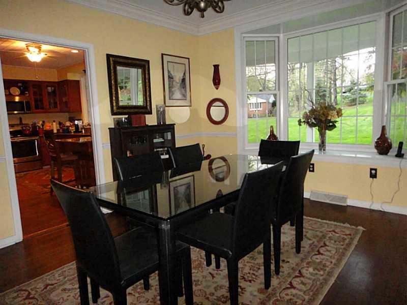 221 Orr Road Upper St. Clair, PA 15241 - Photo 5 of 25 Kitchen. View from the dining room into kitchen and out the bay window to the front porch and front lawn
