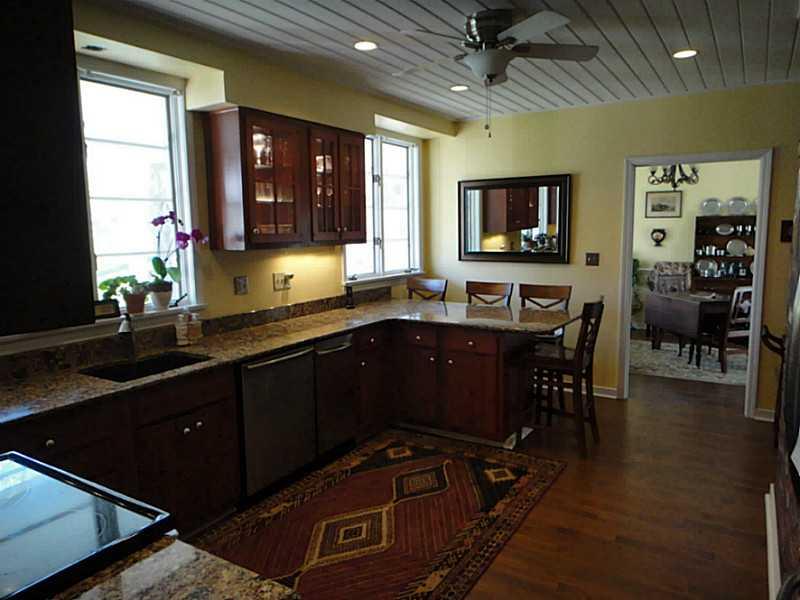 221 Orr Road Upper St. Clair, PA 15241 - Photo 8 of 25 Kitchen. View of the kitchen with cherry cabinetry and granite counter tops and stainless steel appliances note the 4 seats at the counter