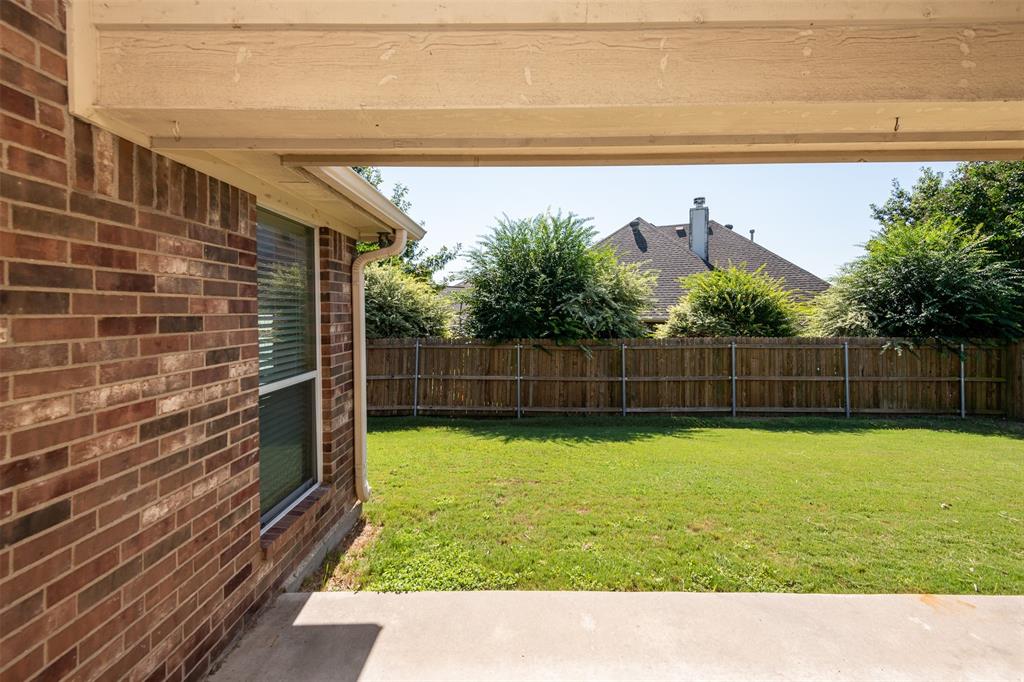 10913 Golfview Way Benbrook, TX 76126 - Photo 17 of 19 a bathroom with a bathtub and a shower