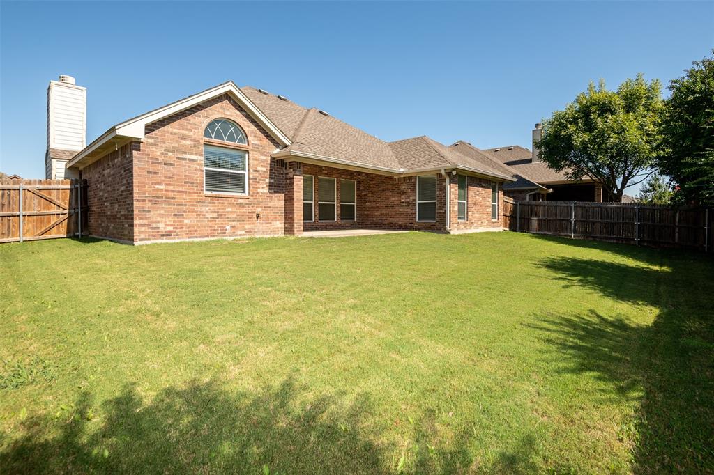 10913 Golfview Way Benbrook, TX 76126 - Photo 19 of 19 a front view of a house with a yard