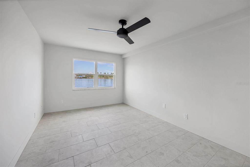 226 Golden Gate Point, Unit 12 Sarasota, FL 34236 - Photo 38 of 52 an empty room with windows