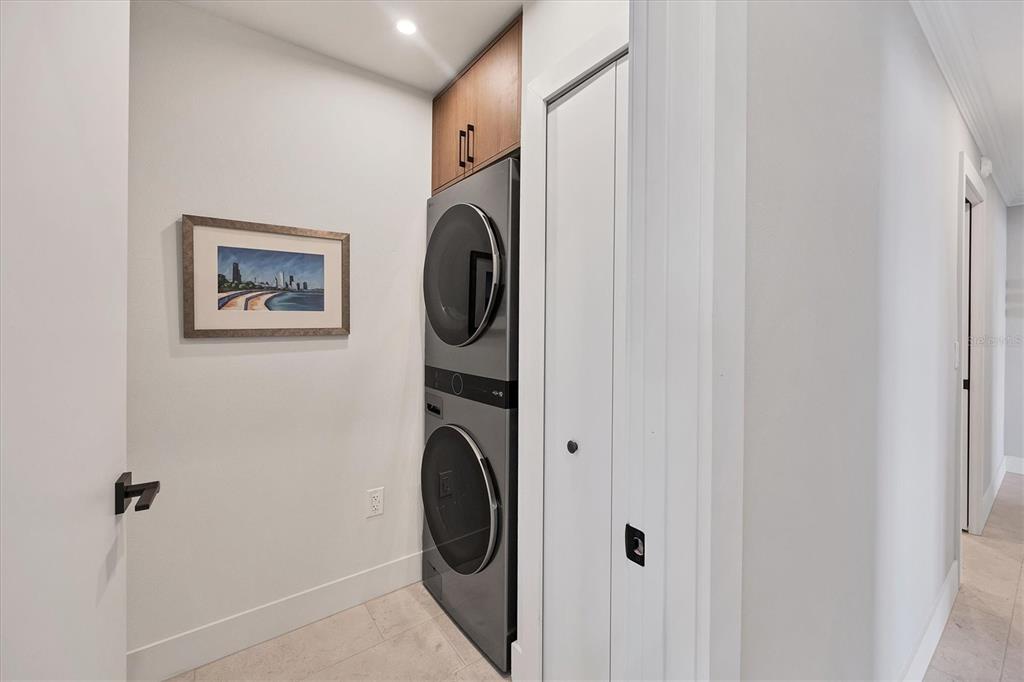 226 Golden Gate Point, Unit 12 Sarasota, FL 34236 - Photo 41 of 52 a utility room with dryer and washer