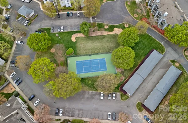 an aerial view of residential house with outdoor space and swimming pool