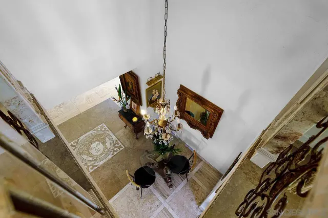 a view of living room with furniture and a flat screen tv