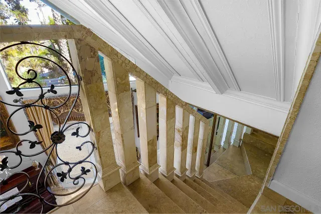 a view of a entryway door with wooden floor