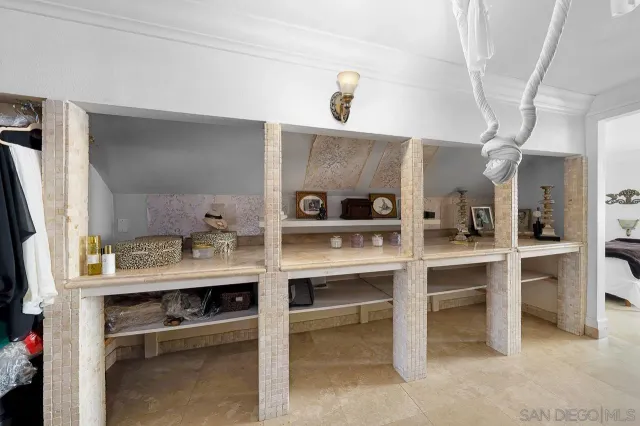 a view of cabinets a sink and dishwasher in a kitchen