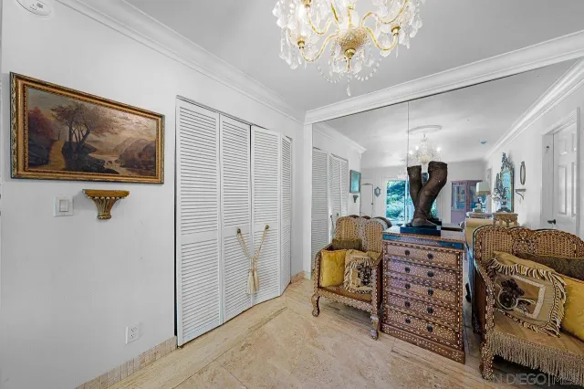 a view of hall way with furniture