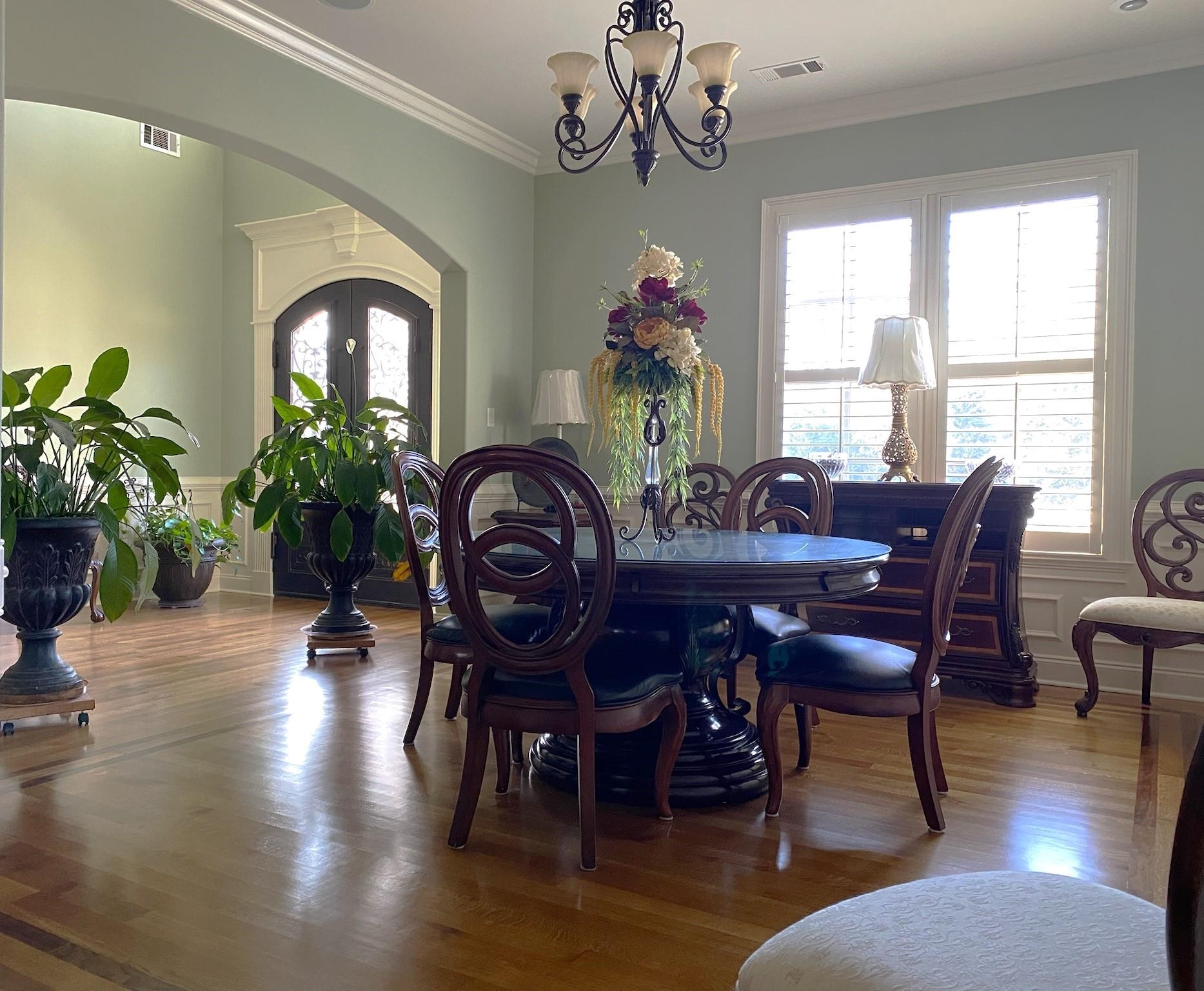 930 Snowden Farm Road Collierville, TN 38017 - Photo 11 of 38 a view of a dining room with furniture window and wooden floor