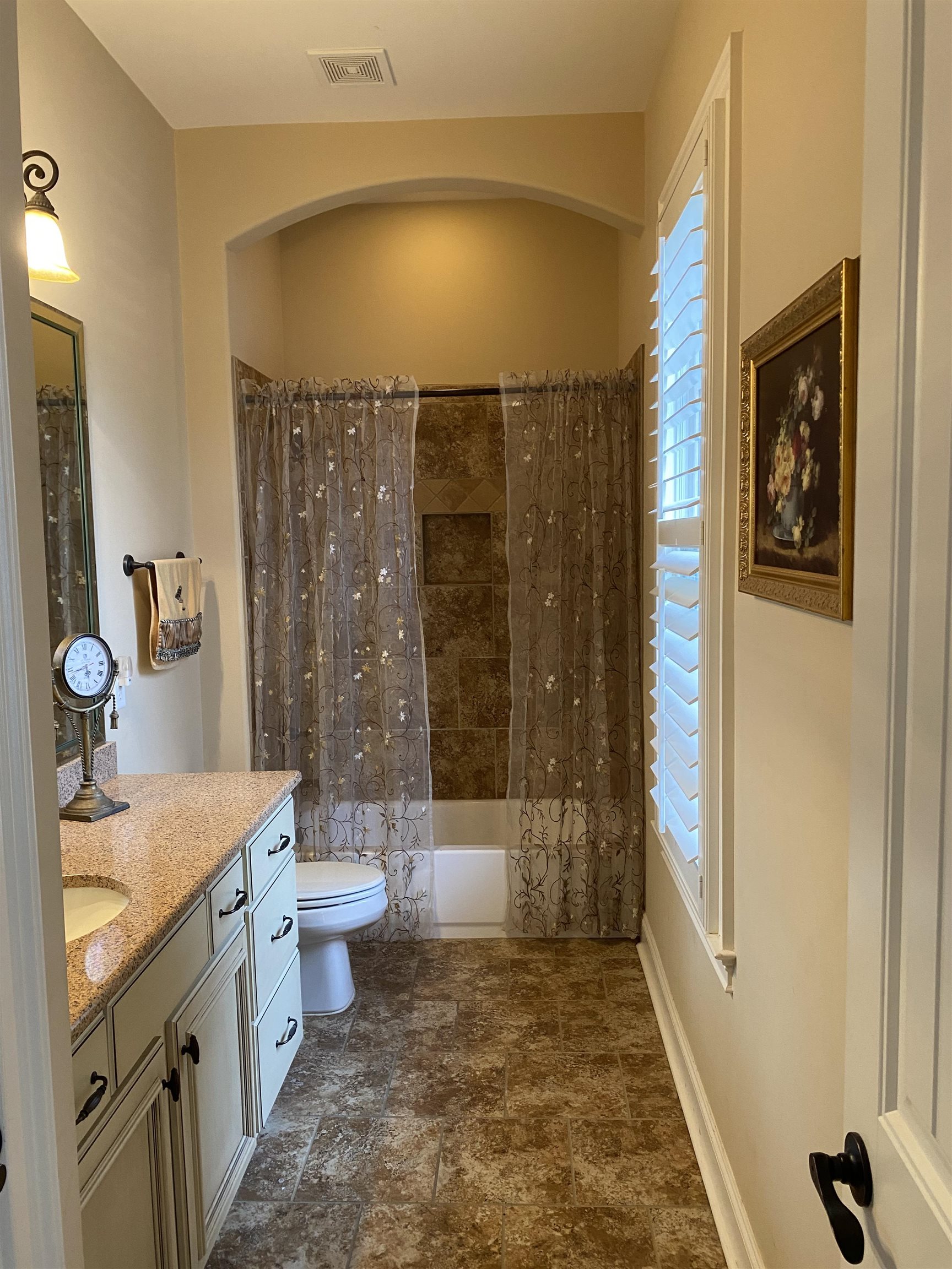 930 Snowden Farm Road Collierville, TN 38017 - Photo 18 of 38 a bathroom with a sink a toilet and shower