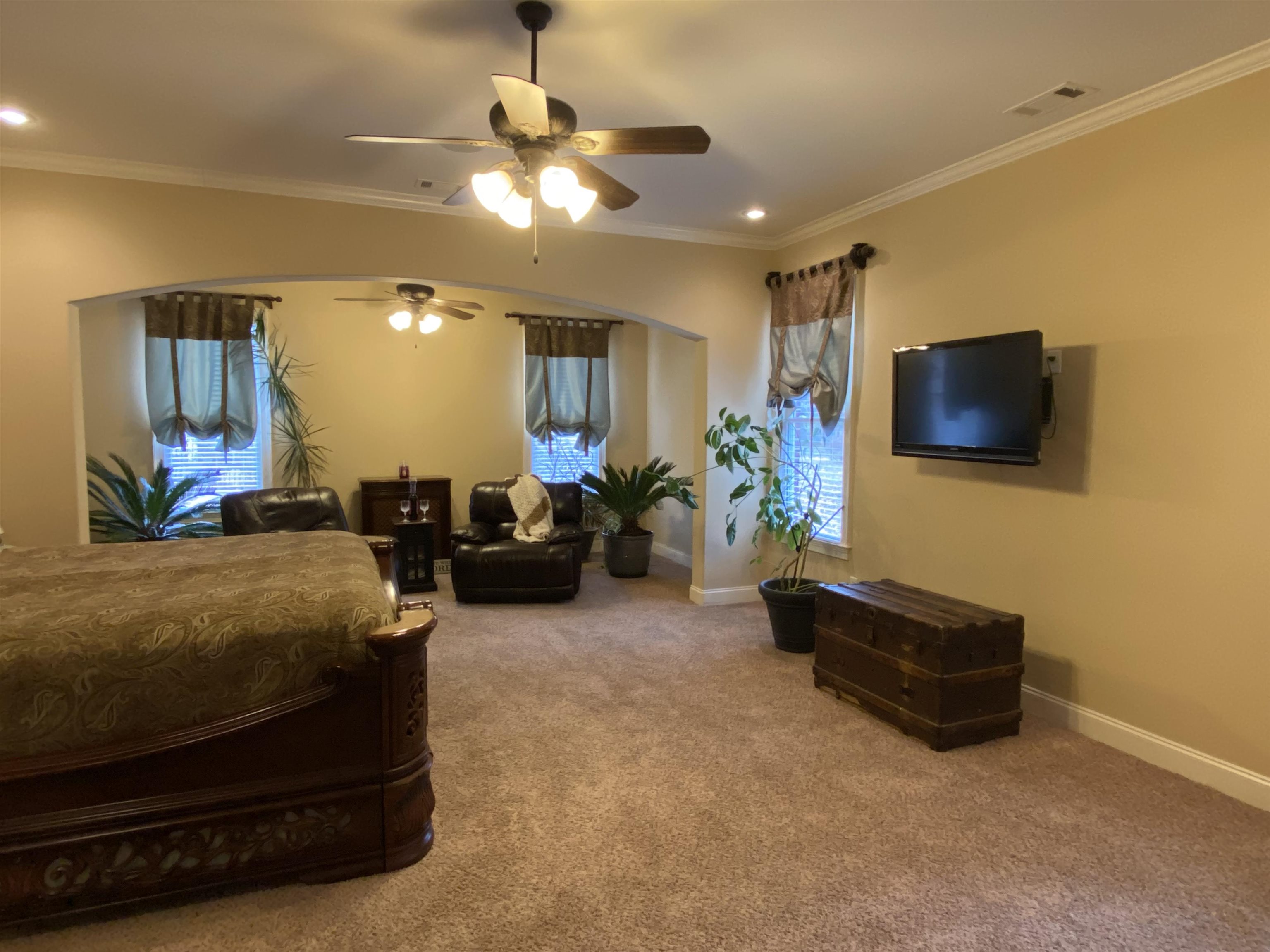 930 Snowden Farm Road Collierville, TN 38017 - Photo 22 of 38 a living room with furniture and a flat screen tv