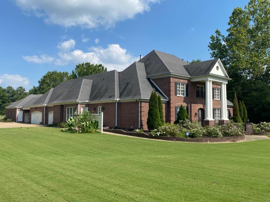 930 Snowden Farm Road Collierville, TN 38017 - Photo 3 of 38 front view of a house with a yard