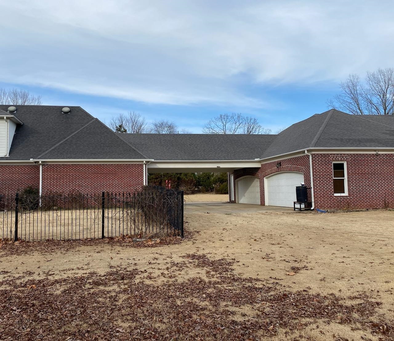 930 Snowden Farm Road Collierville, TN 38017 - Photo 35 of 38 front view of a house with a yard