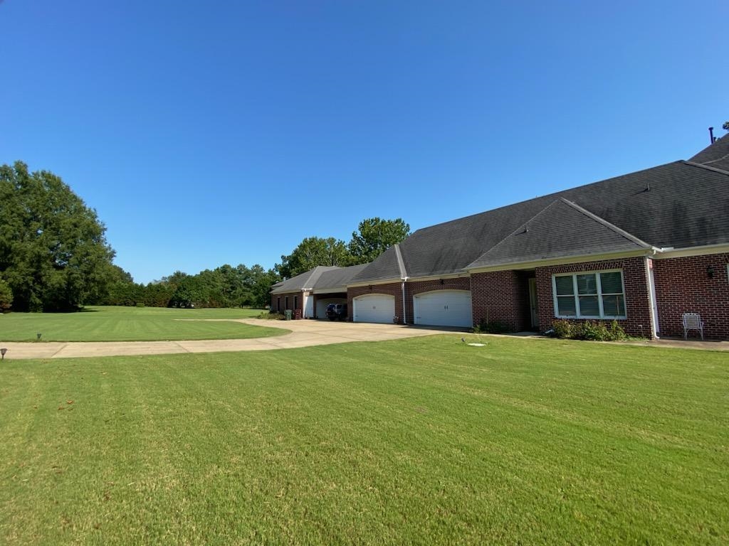 930 Snowden Farm Road Collierville, TN 38017 - Photo 6 of 38 a view of a house with a yard