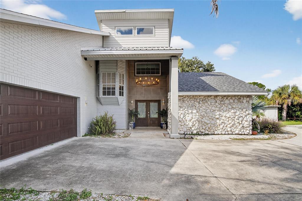 3309 Timberlee Road Wimauma, FL 33598 - Photo 2 of 55 a front view of a house with a yard