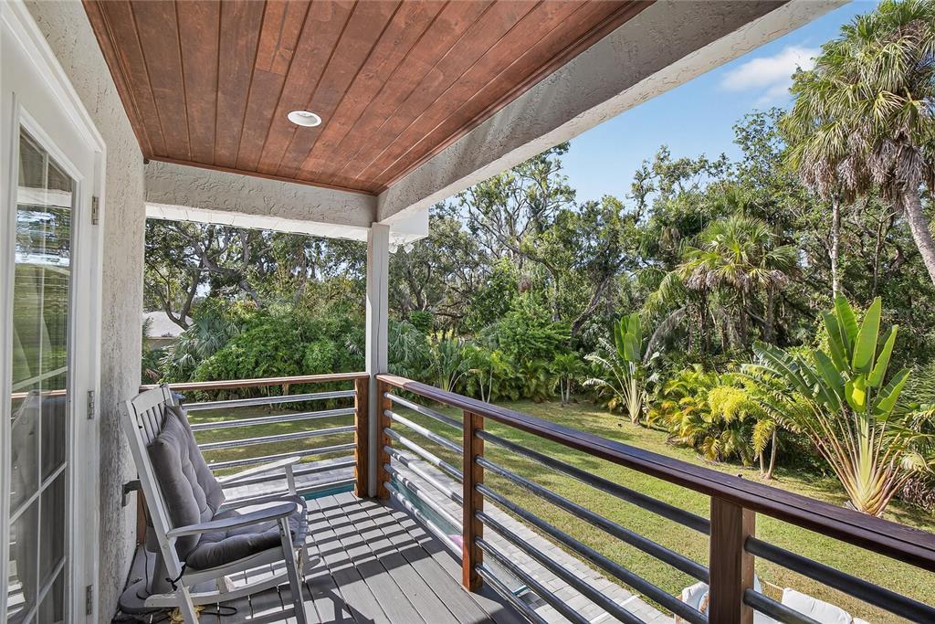 3309 Timberlee Road Wimauma, FL 33598 - Photo 22 of 55 a view of a two chair in the balcony