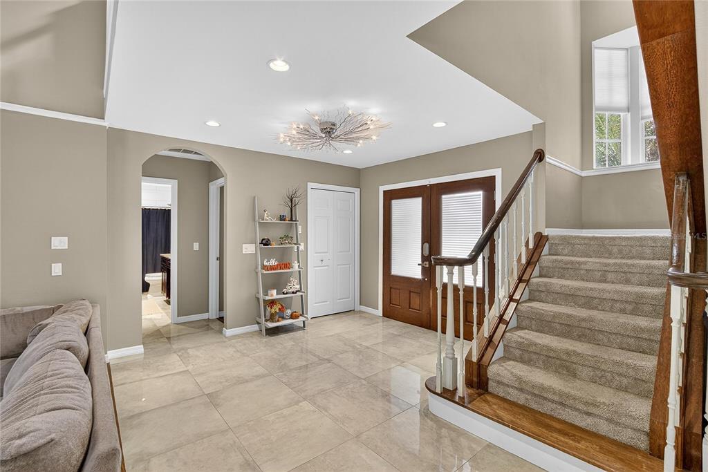 3309 Timberlee Road Wimauma, FL 33598 - Photo 5 of 55 a view of a livingroom with furniture and staircase