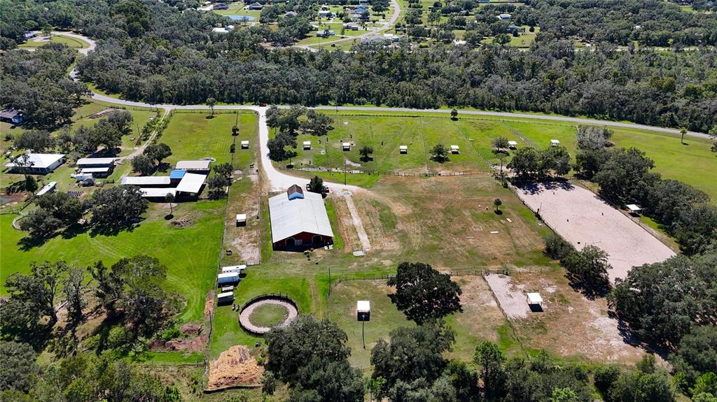 3309 Timberlee Road Wimauma, FL 33598 - Photo 53 of 55 an aerial view of a house with a garden