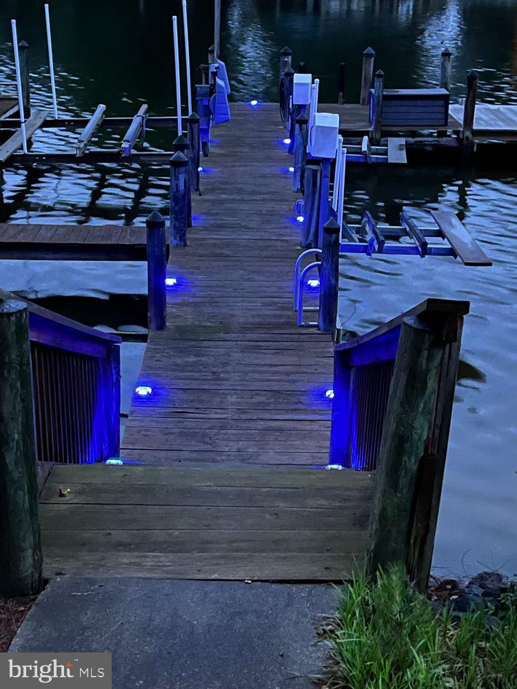 52 Reef Court Montross, VA 22520 - Photo 15 of 76 Dock has blue lights