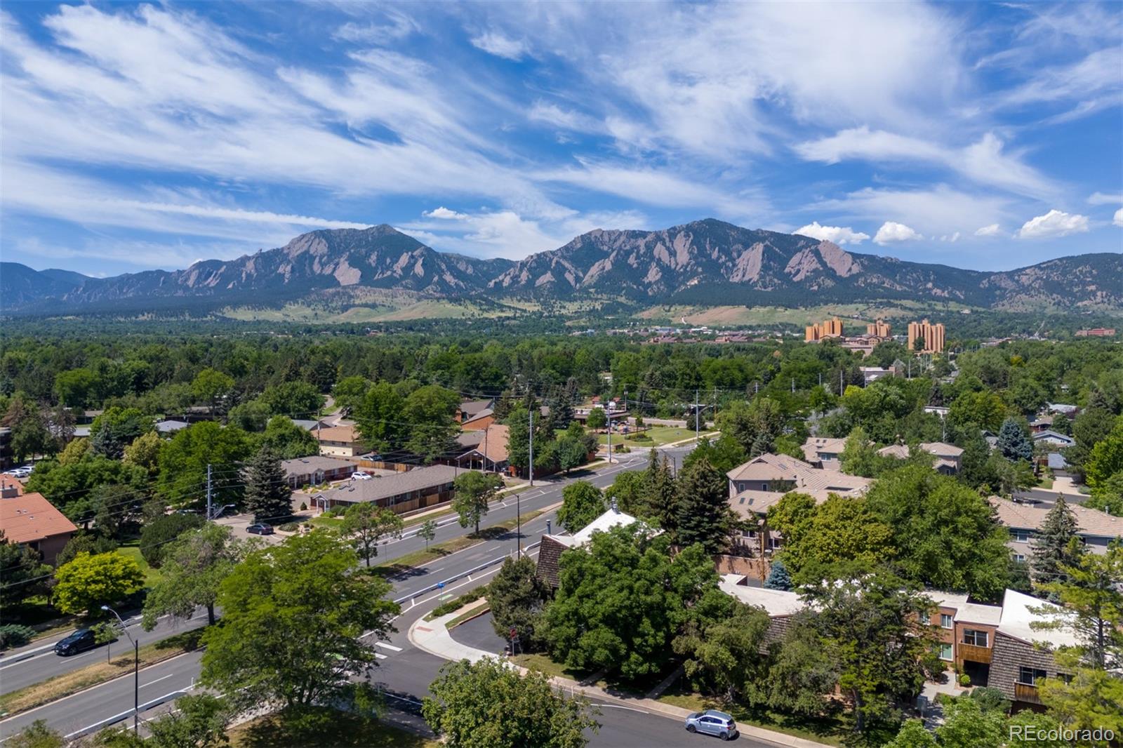 745 Thomas Drive, Unit 2 Boulder, CO 80303 - Photo 2 of 30 a view of a city with mountains in the background