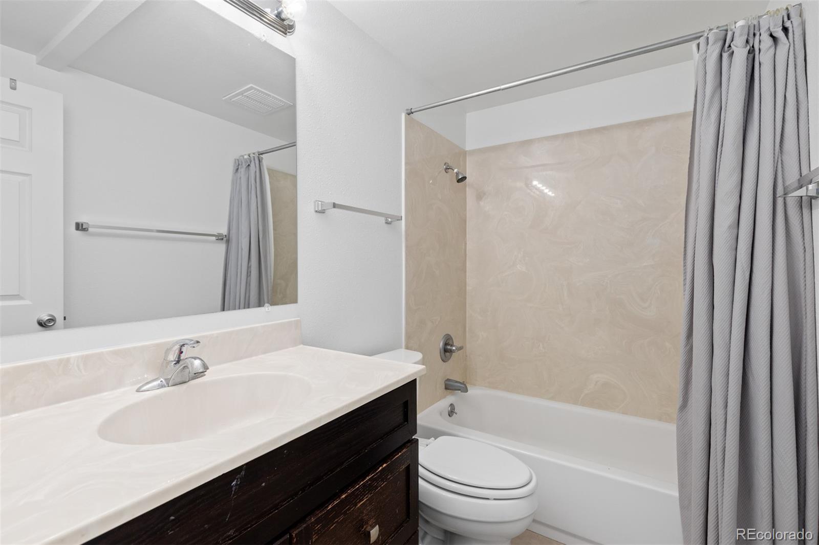 745 Thomas Drive, Unit 2 Boulder, CO 80303 - Photo 22 of 30 a bathroom with a sink a toilet and shower