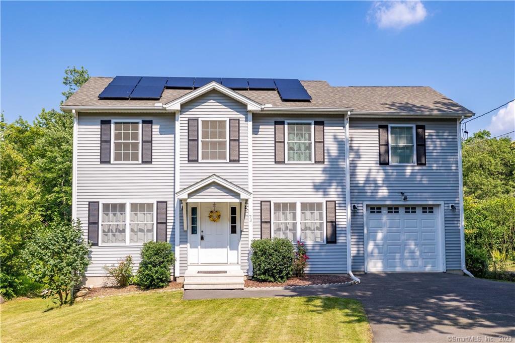 73 Witches Rock Road Bristol, CT 06010 - Photo 1 of 1 a front view of a house with swimming pool