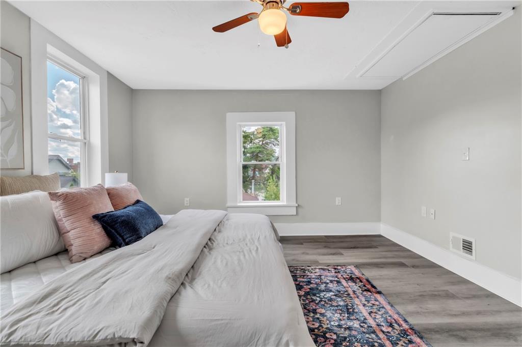 305 1/2 East Lutton Street New Castle, PA 16101 - Photo 19 of 39 a bedroom with a large bed and a window