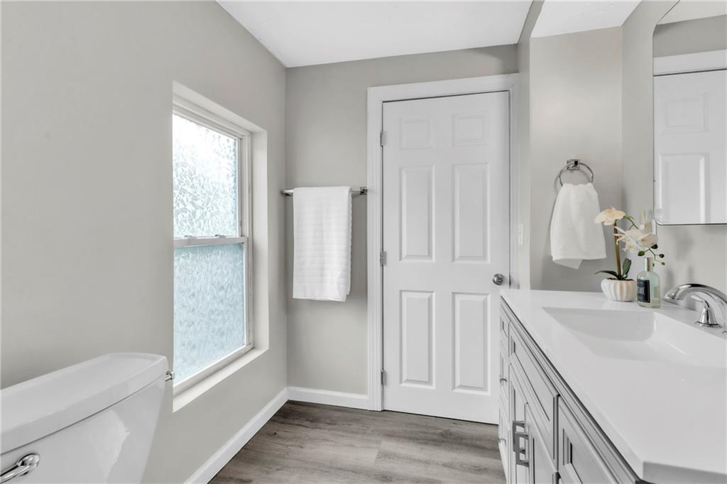 305 1/2 East Lutton Street New Castle, PA 16101 - Photo 23 of 39 a bathroom with a sink and a mirror