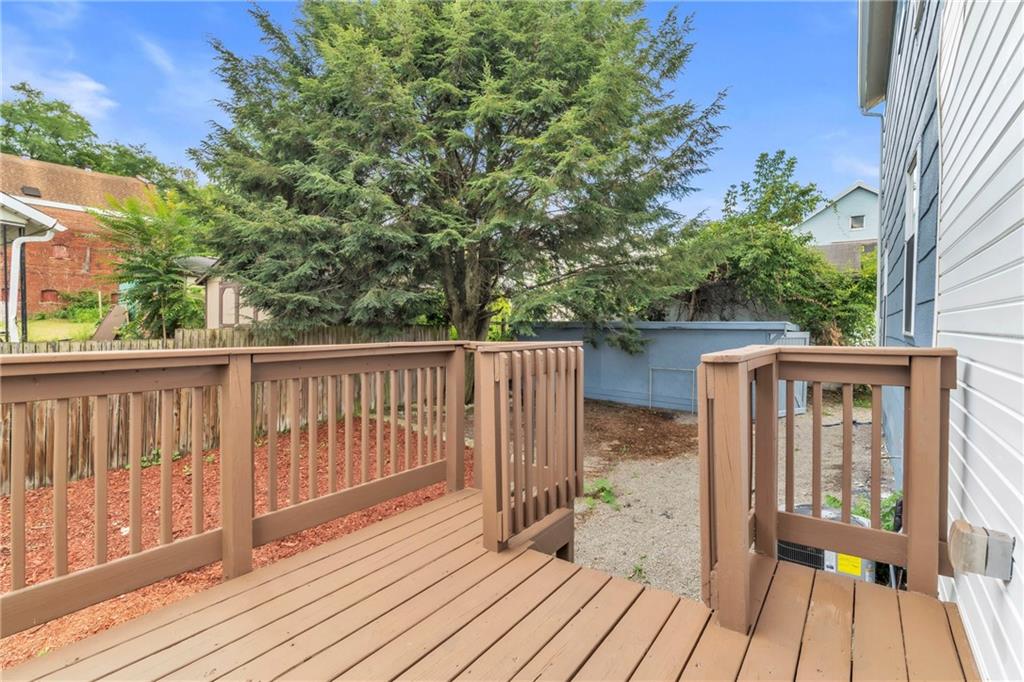 305 1/2 East Lutton Street New Castle, PA 16101 - Photo 30 of 39 a view of balcony with wooden floor and fence