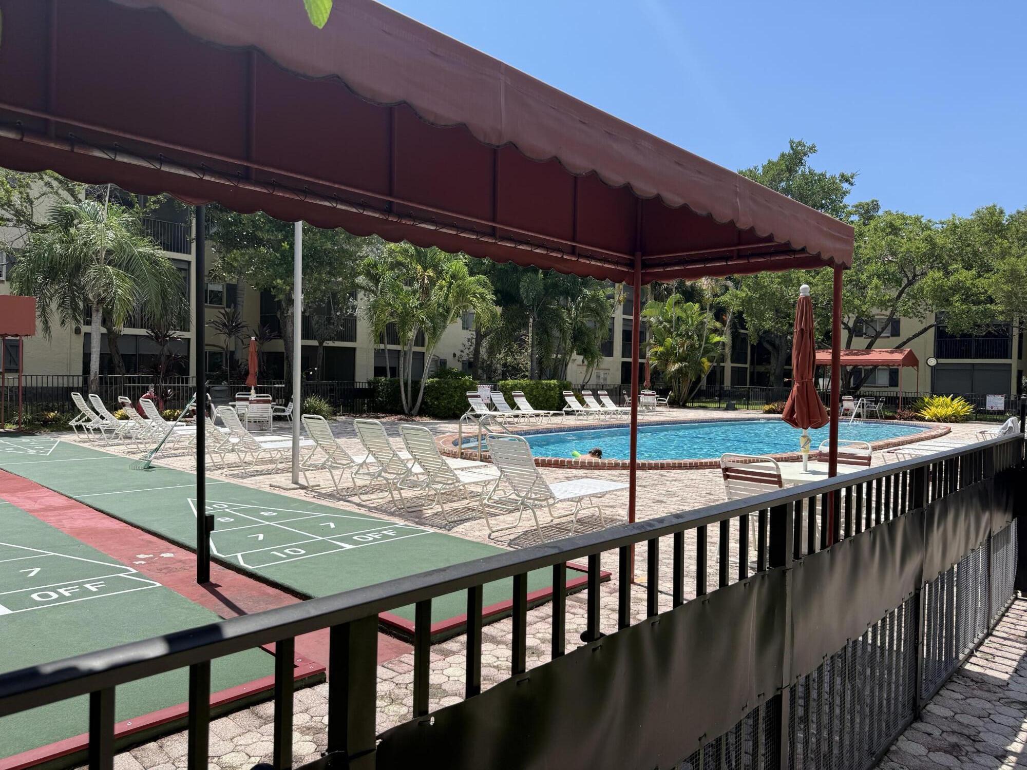 255 South Cypress Road, Unit 339 Pompano Beach, FL 33060 - Photo 13 of 14 bocce /pool area