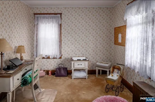 a living room with furniture and window