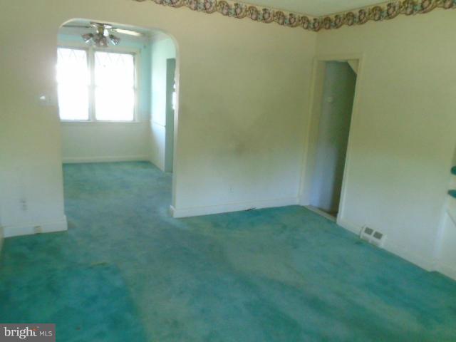 104 Wiltshire Road Baltimore, MD 21221 - Photo 13 of 13 an empty room with a window