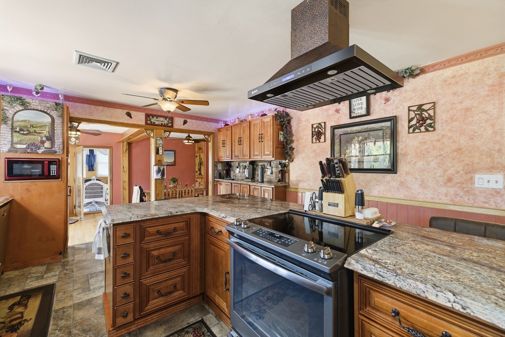 284 North Woodstock Road Southbridge, MA 01550 - Photo 9 of 42 a kitchen that has a sink a stove counter space and cabinets